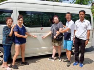 Picture of our happy guests with our driver Tony